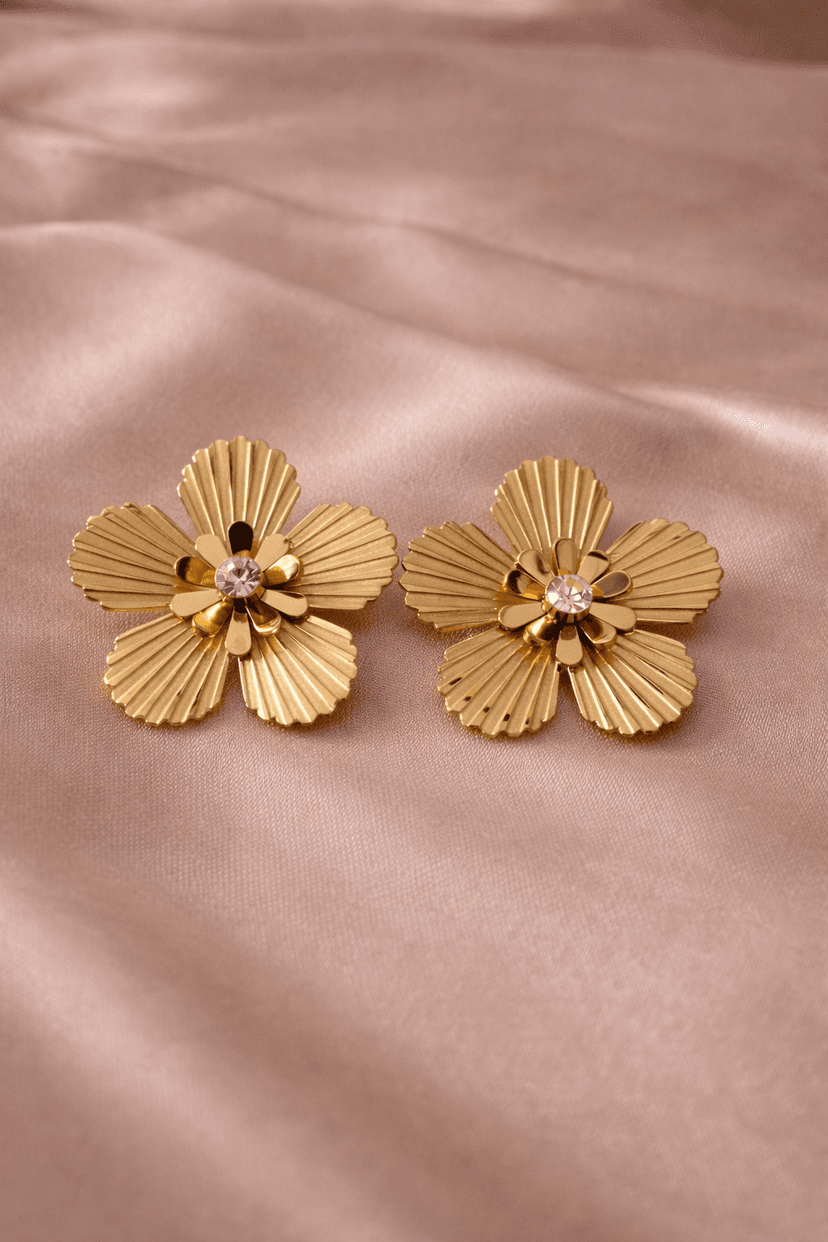 GOLD TONED FLOWER